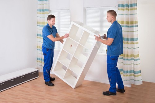 Office furniture being removed by clearance experts